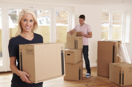 Staff handling furniture during a professional house move