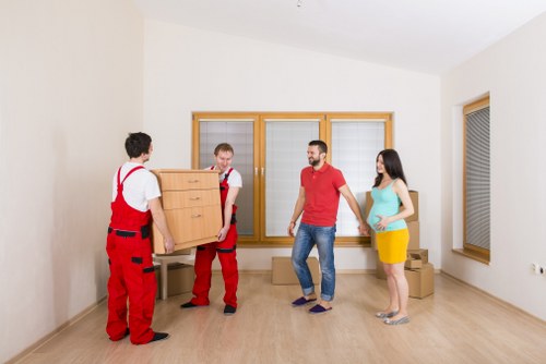 Local moving crew handling a home relocation in southwest London