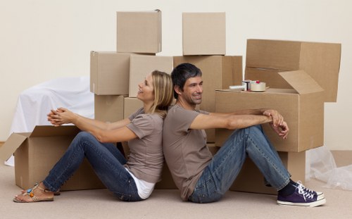 Packed boxes and furniture ready for house removals in Putney