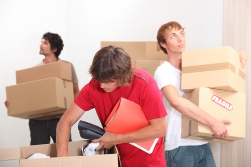 Checklist and packed boxes ready for a move in Putney