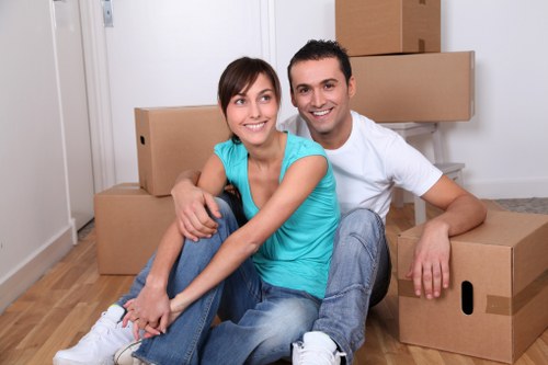 Professional movers loading furniture for a local Putney relocation