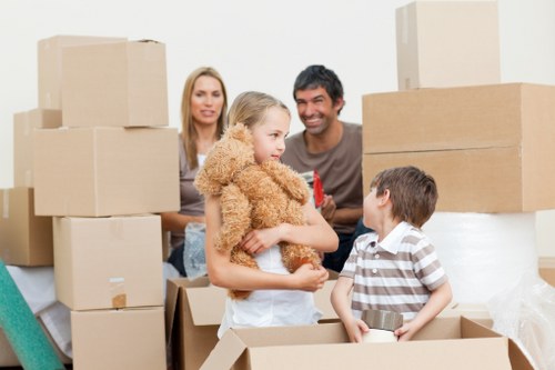 Local moving team handling boxes near Putney residences